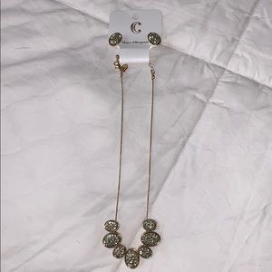 Gold statement necklace and earrings